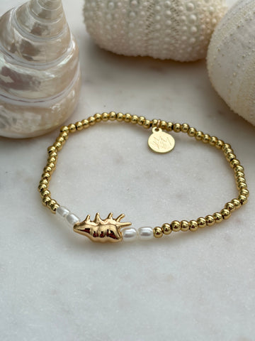 Armbandje schelp met pareltjes