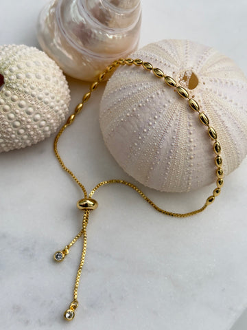 Armbandje, lange kraaltjes, goldplated